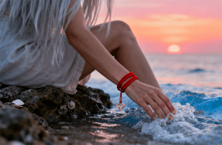 The Red Thread Bracelet: Unraveling Its Meaning, History & How to Wear It - DestinyAxis